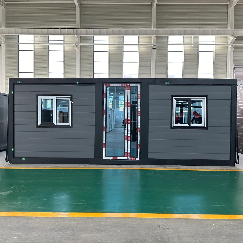 Qinbo Modern 30 — Grey exterior — front view Grey front elevation with a central glazed door and one window on each side.