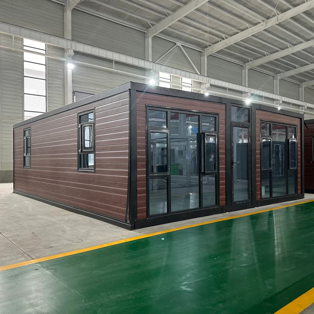 Brown wood-look exterior with dark framing and large glazed panels across the front.
