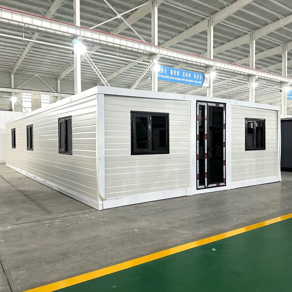 White expandable home showing the front entrance and windows along one side.