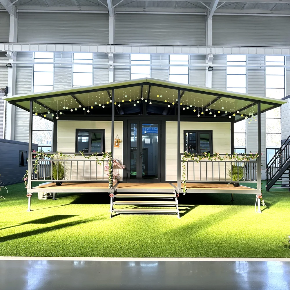 Qinbo Modern 20 — Covered Veranda — Front View Front view of an expandable home with a covered veranda, railings, central steps and decorative lighting.
