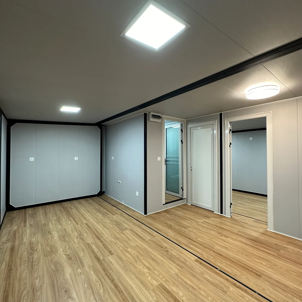 Interior — partition doorways Unfurnished interior with light wood-look flooring and several doorways around a central partition.