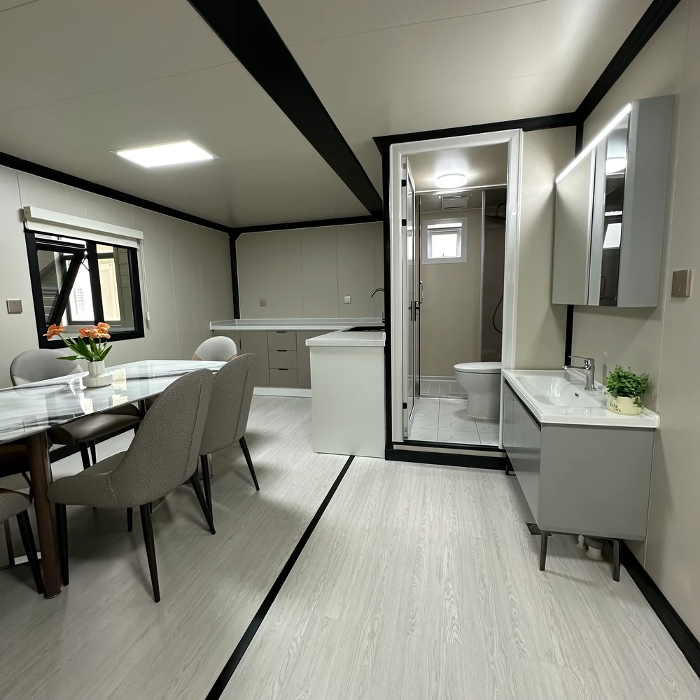 Dining area and bathroom access Dining area beside a basin cabinet, bathroom entrance and kitchen counter.