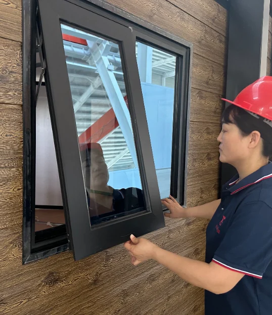 Inspector opening an awning window.