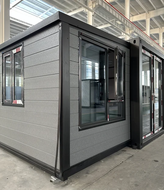 Completed exterior corner with cladding, window and glazed entrance fitted.
