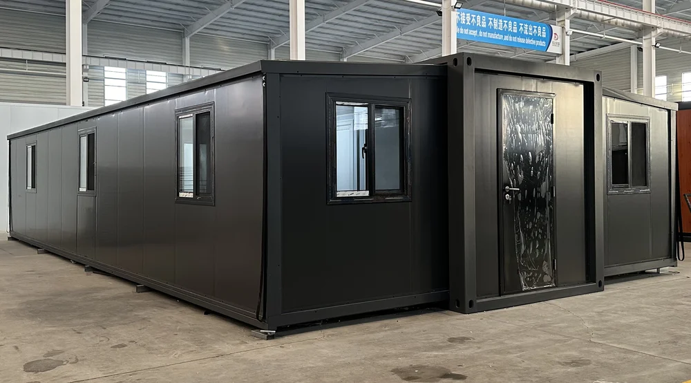 Expandable home with charcoal exterior and smooth finish, EX-E02