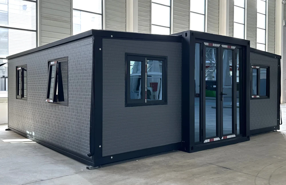 Expandable home with grey exterior and small brick effect finish, EX-M05