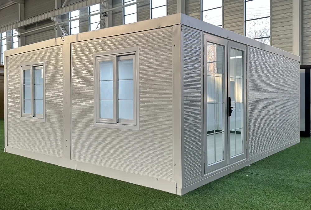 Expandable home with light stone exterior and long stone effect finish, EX-M10