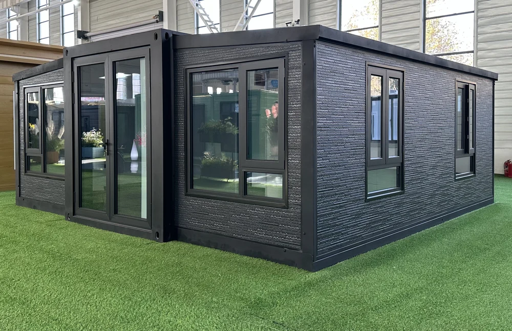 Expandable home with charcoal stone exterior and long stone effect finish, EX-M11